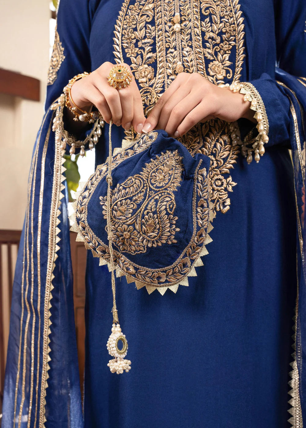 Sonia | Blue Khaddi Silk Embroidered Suit