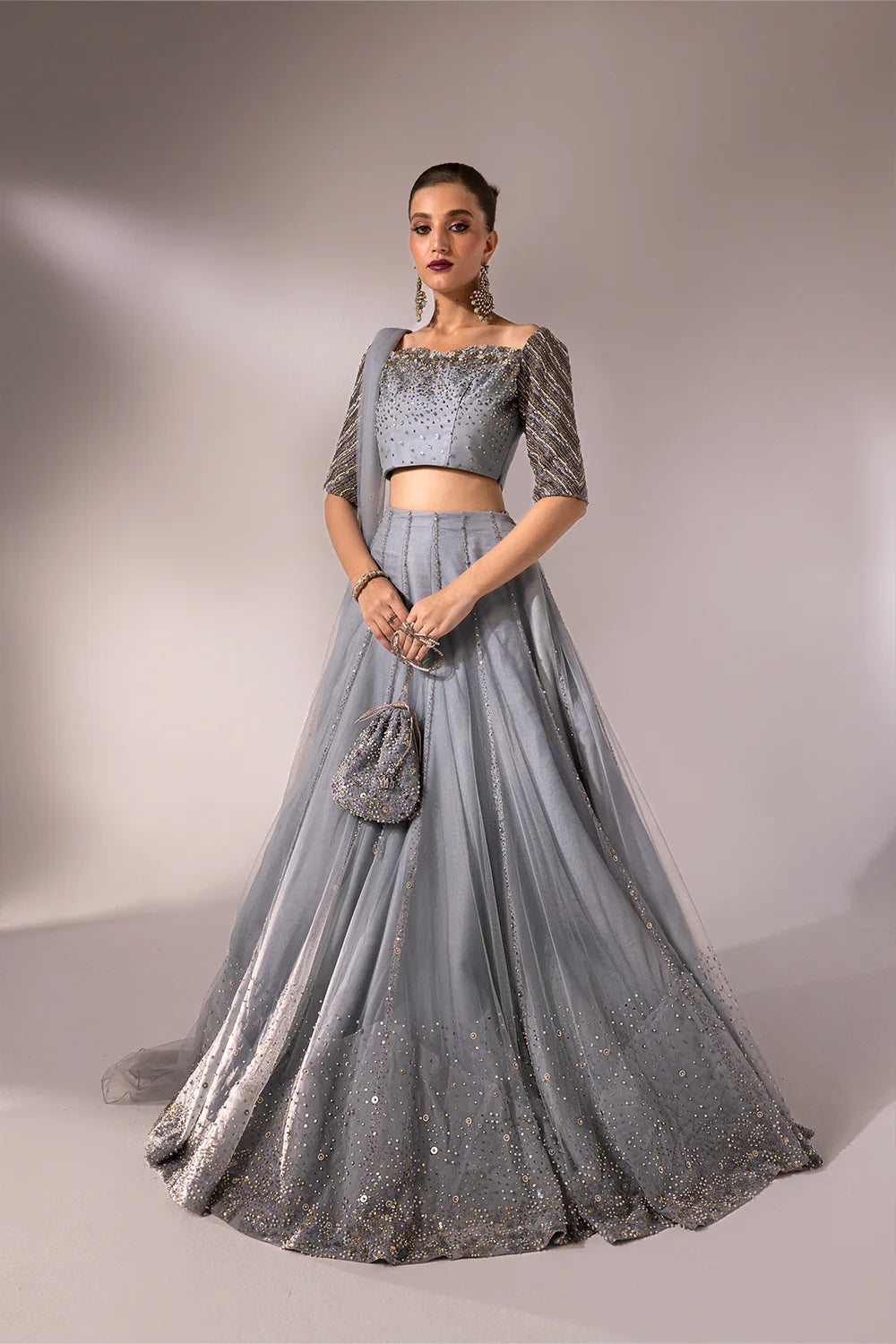Regine | Net Muted Grey Embellished Lehenga Choli