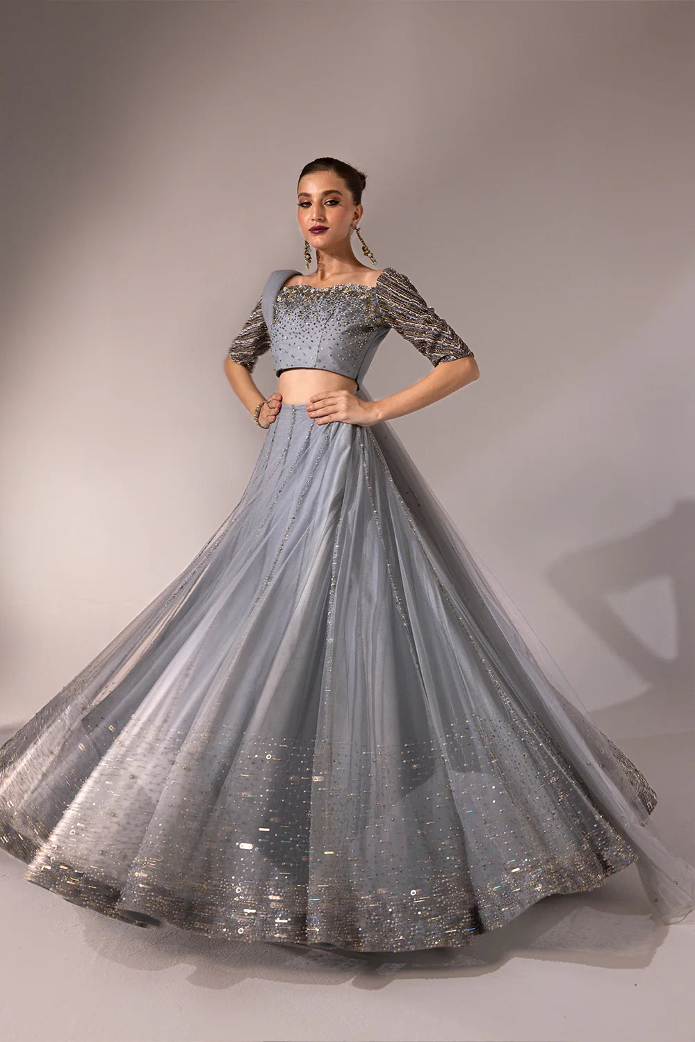 Regine | Net Muted Grey Embellished Lehenga Choli
