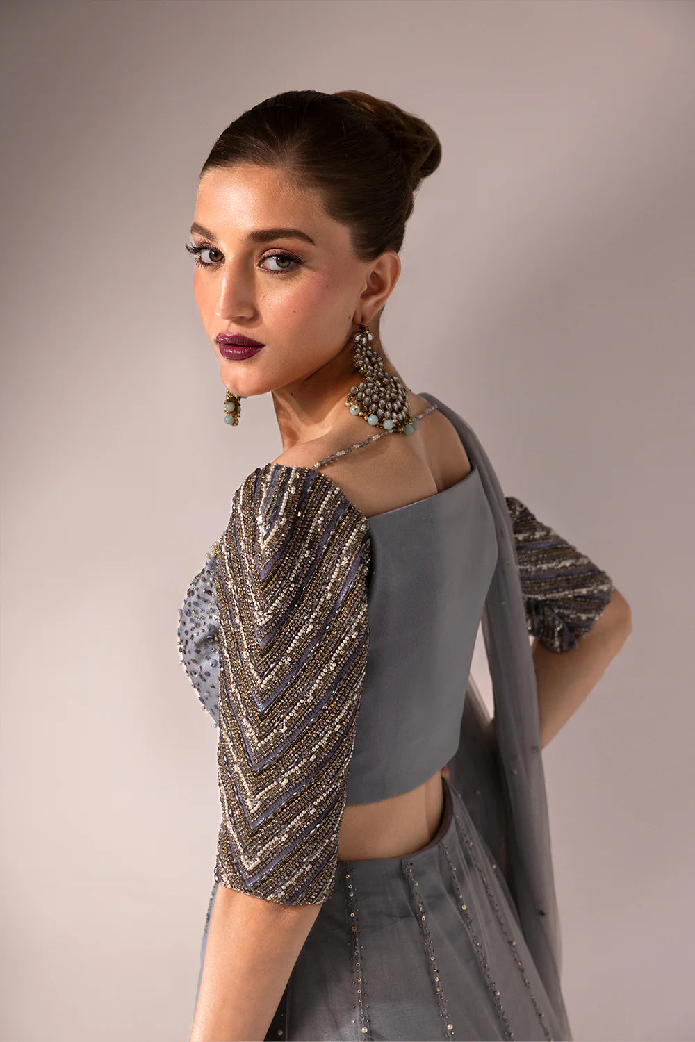 Regine | Net Muted Grey Embellished Lehenga Choli