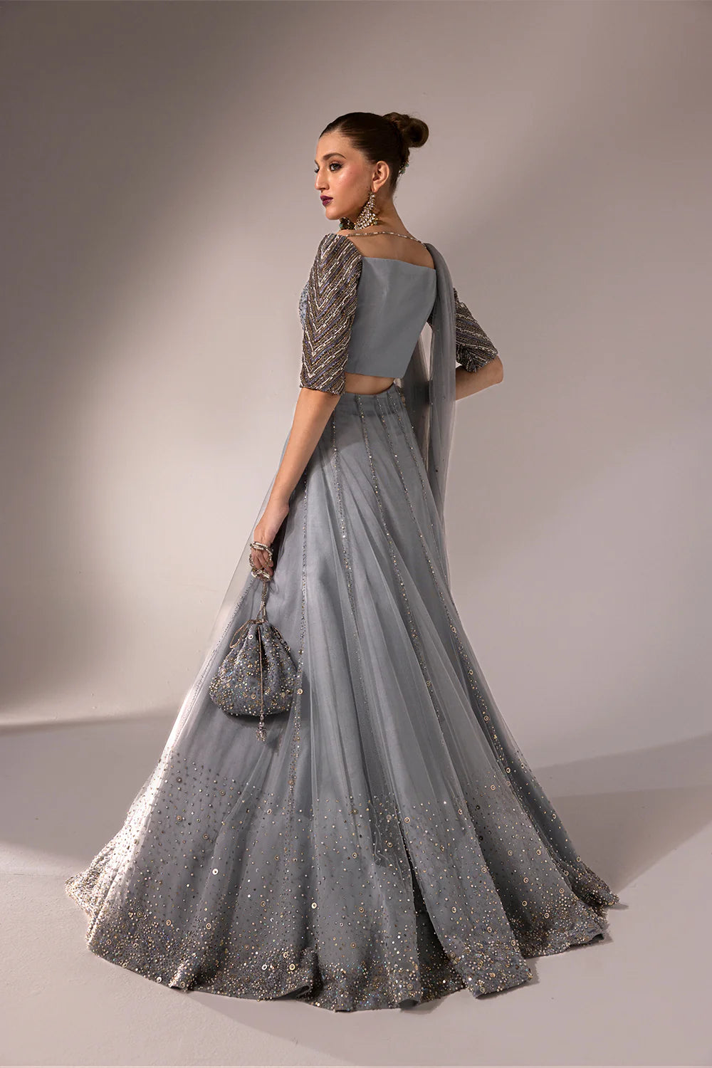 Regine | Net Muted Grey Embellished Lehenga Choli