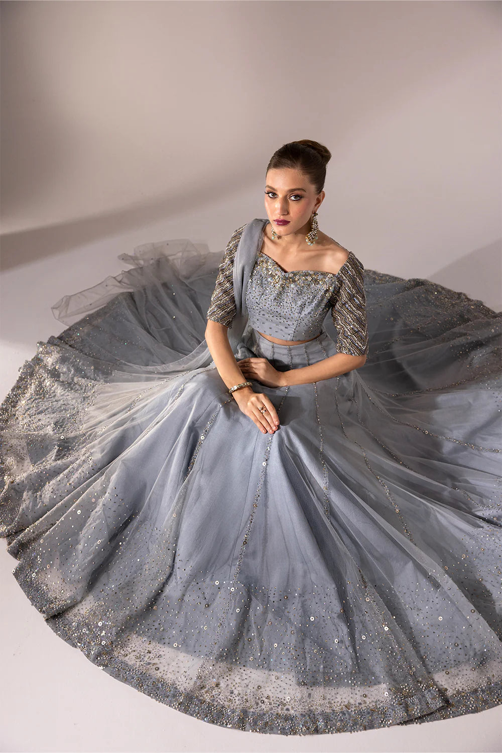 Regine | Net Muted Grey Embellished Lehenga Choli