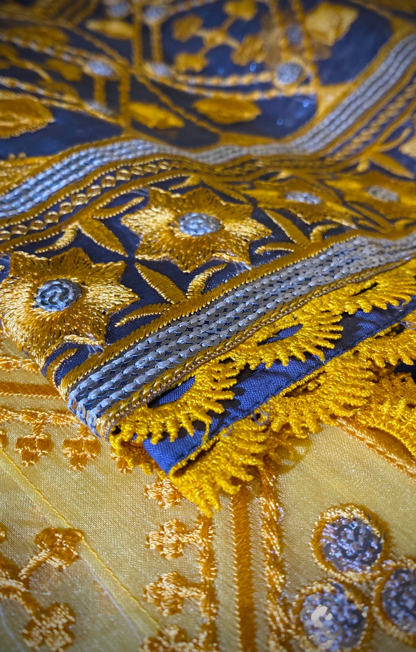 High quality stitching and embroidered sleeve in gold and navy blue colour