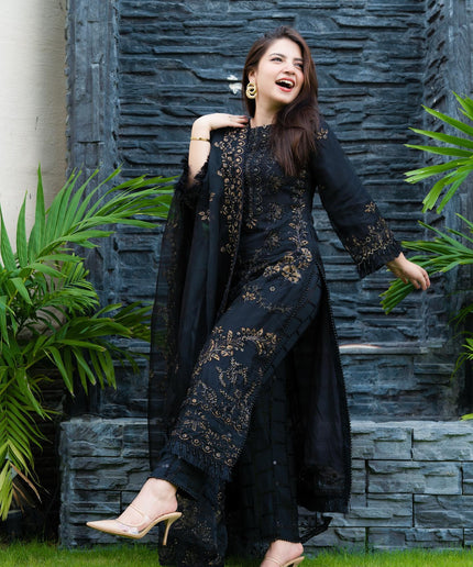 Pakistani model in a black designer dress