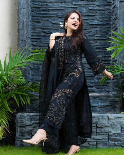 Pakistani model in a black designer dress