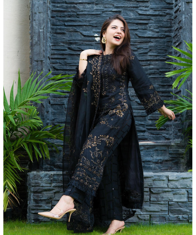 Pakistani model in a black designer dress