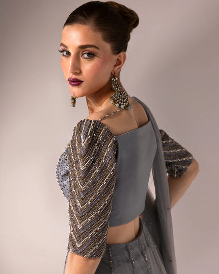 Regine | Net Muted Grey Embellished Lehenga Choli