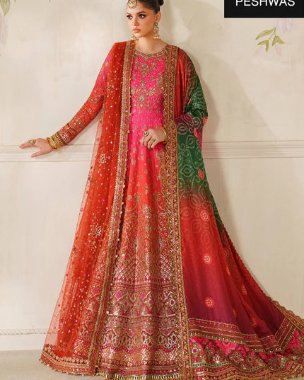 Woman wearing a traditional embroidered outfit with 'Peshwas' branding.