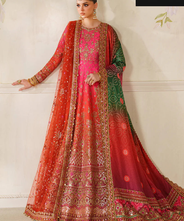 Woman wearing a traditional embroidered outfit with 'Peshwas' branding.