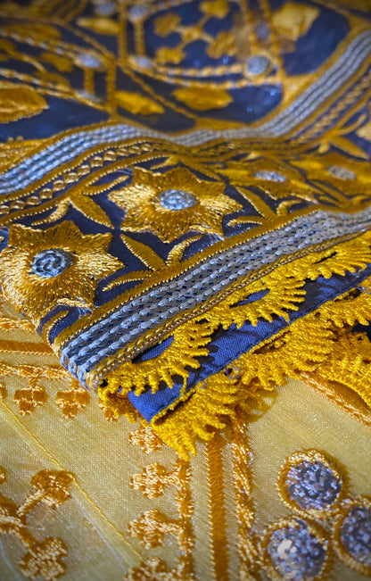 High quality stitching and embroidered sleeve in gold and navy blue colour